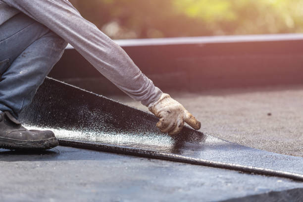 Professional Exterior Waterproofing technician working in Grand Ledge, MI